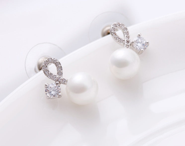 Twist of Fate Pearl Stud Earrings