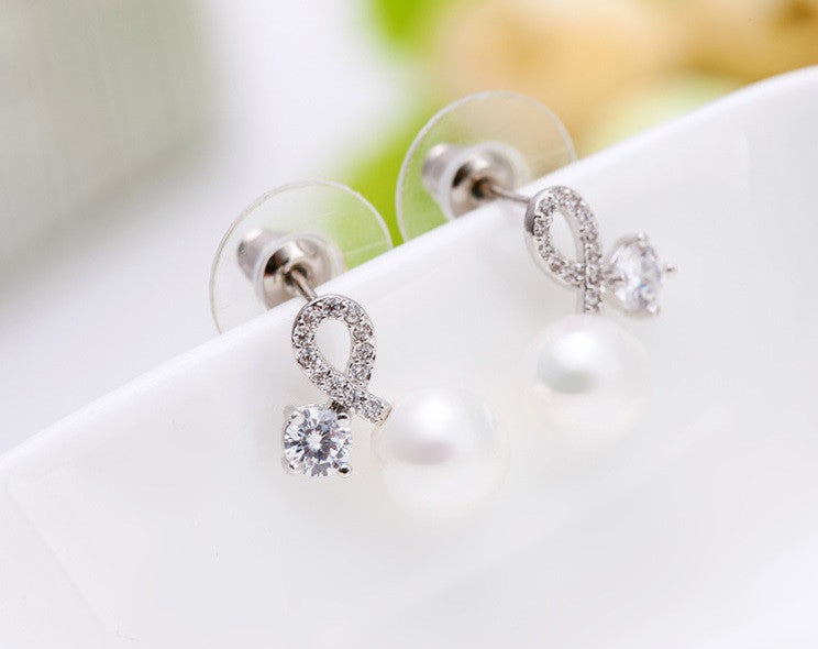 Twist of Fate Pearl Stud Earrings