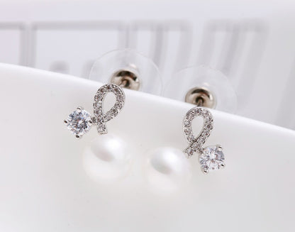 Twist of Fate Pearl Stud Earrings
