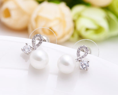 Twist of Fate Pearl Stud Earrings