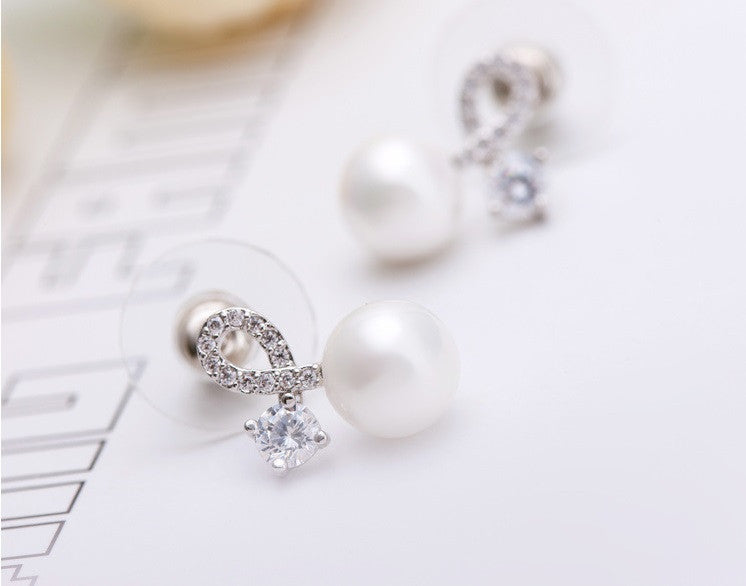 Twist of Fate Pearl Stud Earrings