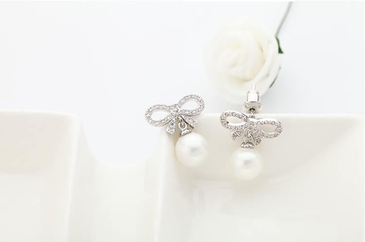 Dream Pearl Bow Stud Earrings